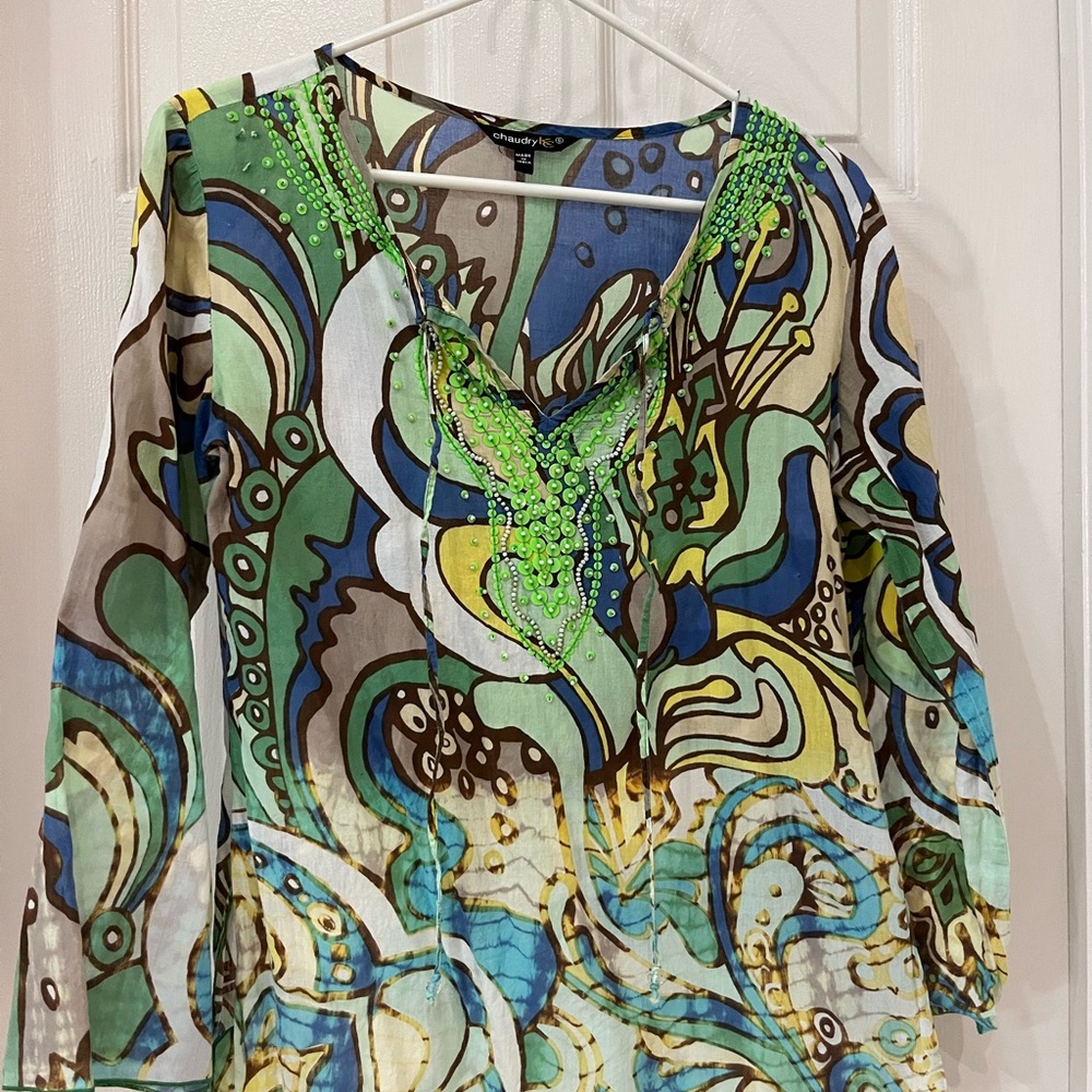 Bohemian loose brightly colored top.